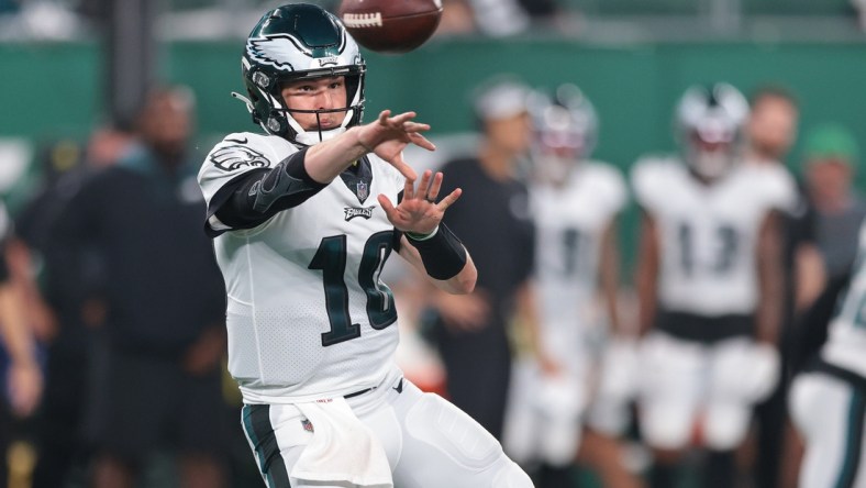 Aug 27, 2021; East Rutherford, New Jersey, USA; Philadelphia Eagles quarterback Nick Mullens (10) throws the ball during the second half against the New York Jets  at MetLife Stadium. Mandatory Credit: Vincent Carchietta-USA TODAY Sports