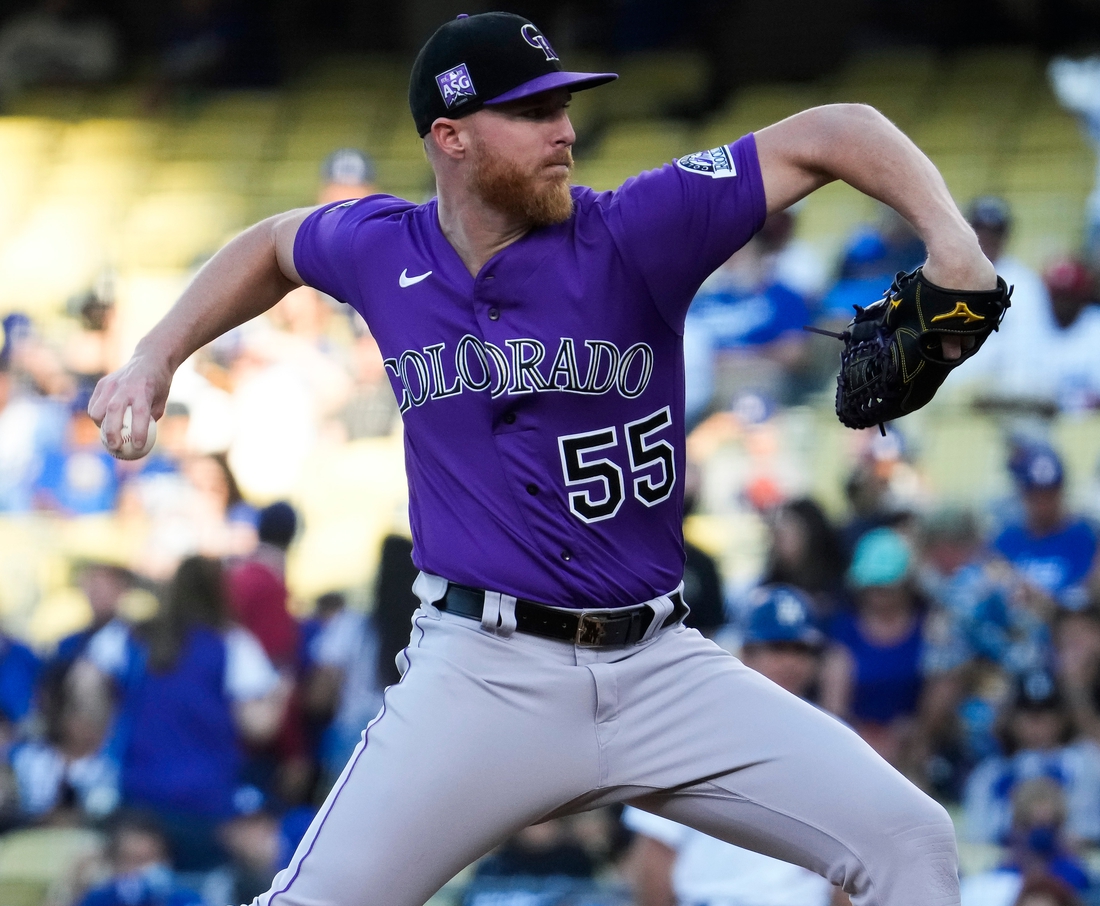 Aug 28, 2021; Los Angeles, California, USA; Colorado Rockies starting pitcher Jon Gray (55) throws a pitch in the first inning against the Los Angeles Dodgers at Dodger Stadium. Mandatory Credit: Robert Hanashiro-USA TODAY Sports