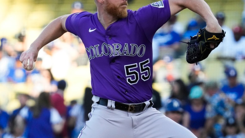 Aug 28, 2021; Los Angeles, California, USA; Colorado Rockies starting pitcher Jon Gray (55) throws a pitch in the first inning against the Los Angeles Dodgers at Dodger Stadium. Mandatory Credit: Robert Hanashiro-USA TODAY Sports