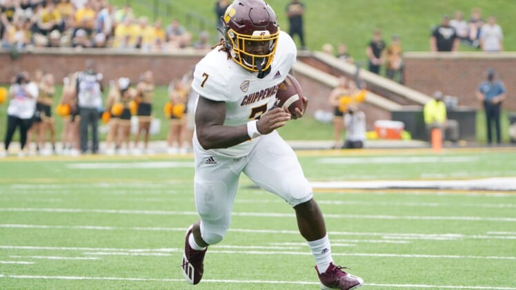 Sep 4, 2021; Columbia, Missouri, USA; Central Michigan Chippewas running back Lew Nichols III (7) runs the ball against the Missouri Tigers during the first half at Faurot Field at Memorial Stadium. Mandatory Credit: Denny Medley-USA TODAY Sports
