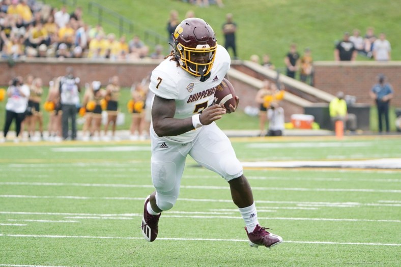 Sep 4, 2021; Columbia, Missouri, USA; Central Michigan Chippewas running back Lew Nichols III (7) runs the ball against the Missouri Tigers during the first half at Faurot Field at Memorial Stadium. Mandatory Credit: Denny Medley-USA TODAY Sports