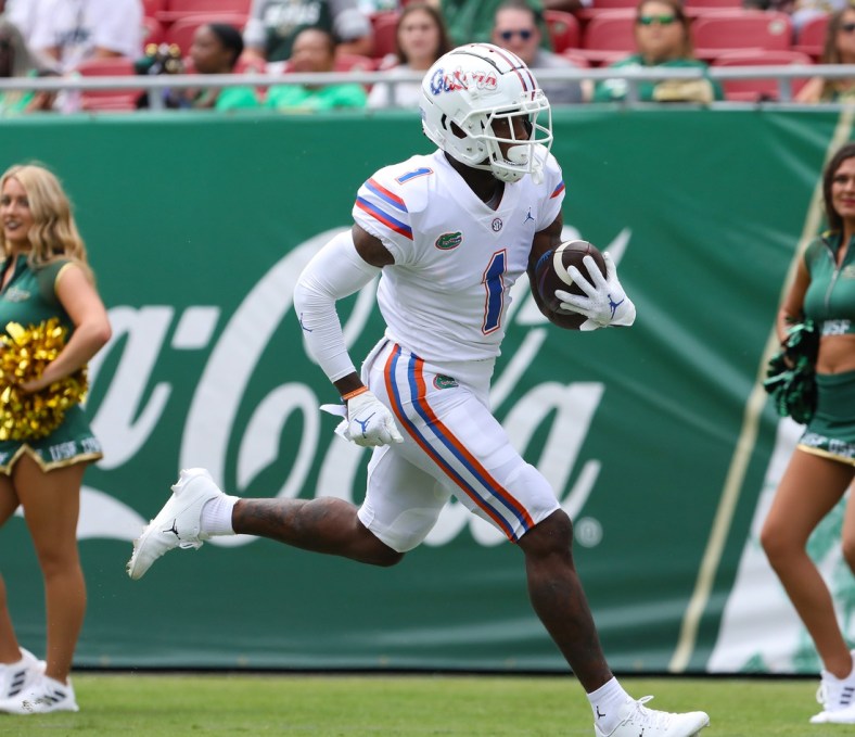 Florida Gators wide receiver Jacob Copeland (1) runs for a touchdown after making a catch during the second game of the season against the USF Bulls at Raymond James Stadium, in Tampa Fla. Sept. 11, 2021.

Flgai 09112021 Ufvs Usf Action09