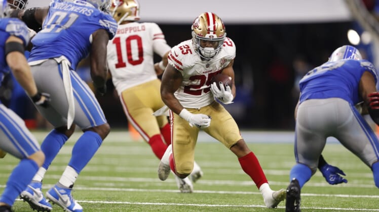 Sep 12, 2021; Detroit, Michigan, USA; San Francisco 49ers running back Elijah Mitchell (25) runs with the ball against the Detroit Lions during the fourth quarter at Ford Field. Mandatory Credit: Raj Mehta-USA TODAY Sports