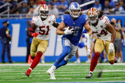 Detroit Lions tight end T.J. Hockenson (88) runs against San Francisco 49ers linebacker Fred Warner (54) during the second half at Ford Field in Detroit on Sunday, Sept. 12, 2021.