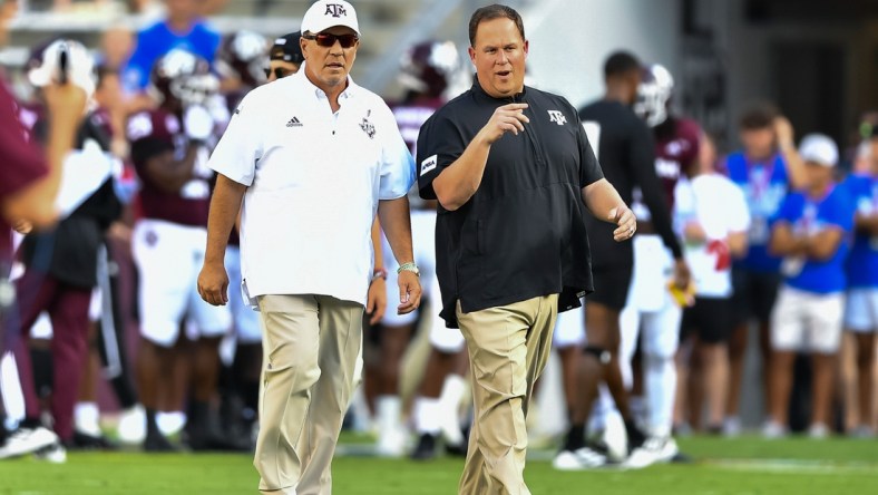 Sep 4, 2021;  College Station, Texas, USA;  Texas A&M Aggies head coach Jimbo Fisher and defensive coordinator Mike Elko prior to the game against the Kent State Golden Flashes at Kyle Field. Mandatory Credit: Maria Lysaker-USA TODAY Sports