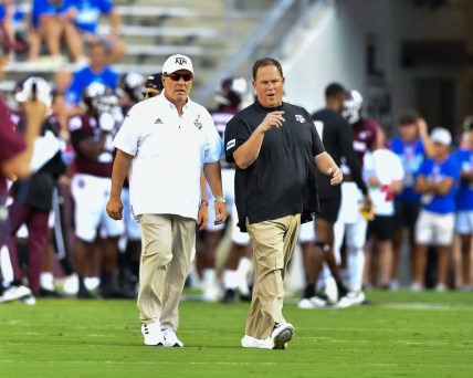 Sep 4, 2021;  College Station, Texas, USA;  Texas A&M Aggies head coach Jimbo Fisher and defensive coordinator Mike Elko prior to the game against the Kent State Golden Flashes at Kyle Field. Mandatory Credit: Maria Lysaker-USA TODAY Sports