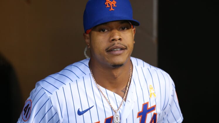 Sep 14, 2021; New York City, New York, USA; New York Mets starting pitcher Marcus Stroman (0) exits the dugout to begin warming up before his start against the St. Louis Cardinals at Citi Field. Mandatory Credit: Brad Penner-USA TODAY Sports