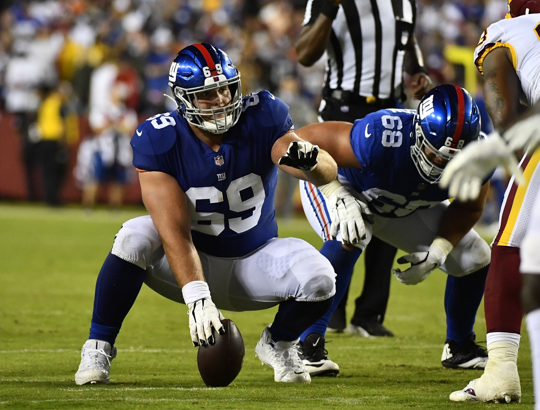 Sep 16, 2021; Landover, Maryland, USA; New York Giants center Billy Price (69) waits to snap the ball against the Washington Football Team during the first half at FedExField. Mandatory Credit: Brad Mills-USA TODAY Sports