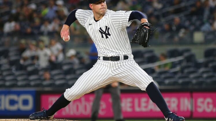 Sep 17, 2021; Bronx, New York, USA; New York Yankees starting pitcher Corey Kluber (28) pitches against the Cleveland Indians during the first inning at Yankee Stadium. Mandatory Credit: Andy Marlin-USA TODAY Sports