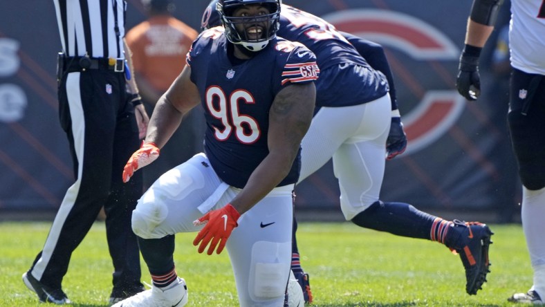 Sep 19, 2021; Chicago, Illinois, USA; Chicago Bears defensive end Akiem Hicks (96) reacts after sacking Cincinnati Bengals quarterback Joe Burrow (not pictured) during the second half at Soldier Field. Mandatory Credit: Mike Dinovo-USA TODAY Sports