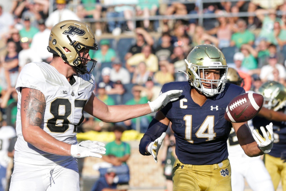 Notre Dame safety Kyle Hamilton (14) intercepts a pass intended for Purdue tight end Payne Durham (87) in the end zone during the fourth quarter of an NCAA football game, Saturday, Sept. 18, 2021 at Notre Dame Stadium in South Bend.

Cfb Notre Dame Vs Purdue