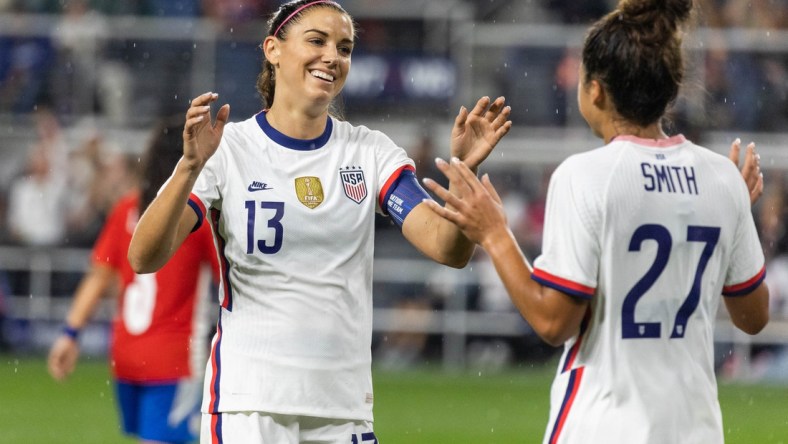 Sep 21, 2021; Cincinnati, Ohio, USA; United States forward Alex Morgan (13) celebrates forward Sophia Smith (27) after scoring her second goal against Paraguay with during an international friendly soccer match at TQL Stadium. Mandatory Credit: Trevor Ruszkowski-USA TODAY Sports