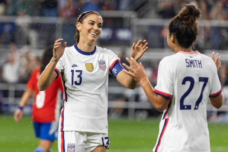 Sep 21, 2021; Cincinnati, Ohio, USA; United States forward Alex Morgan (13) celebrates forward Sophia Smith (27) after scoring her second goal against Paraguay with during an international friendly soccer match at TQL Stadium. Mandatory Credit: Trevor Ruszkowski-USA TODAY Sports