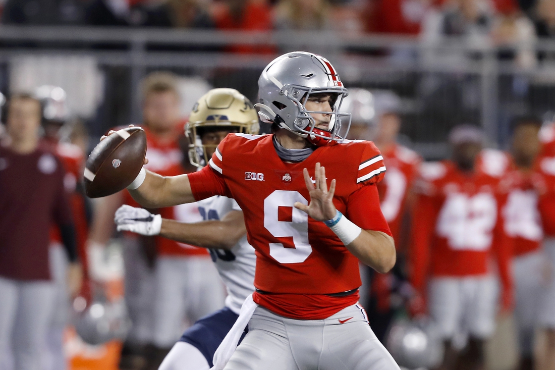 Sep 25, 2021; Columbus, Ohio, USA; Ohio State Buckeyes quarterback Jack Miller III (9) throws during the fourth quarter against the Akron Zips at Ohio Stadium. Mandatory Credit: Joseph Maiorana-USA TODAY Sports