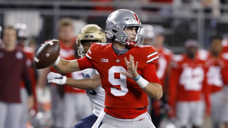 Sep 25, 2021; Columbus, Ohio, USA; Ohio State Buckeyes quarterback Jack Miller III (9) throws during the fourth quarter against the Akron Zips at Ohio Stadium. Mandatory Credit: Joseph Maiorana-USA TODAY Sports