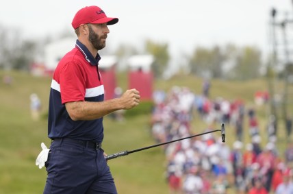 Sep 26, 2021; Haven, Wisconsin, USA; Team USA player Dustin Johnson reacts to his putt on the 15th green during day three singles rounds for the 43rd Ryder Cup golf competition at Whistling Straits. Mandatory Credit: Michael Madrid-USA TODAY Sports