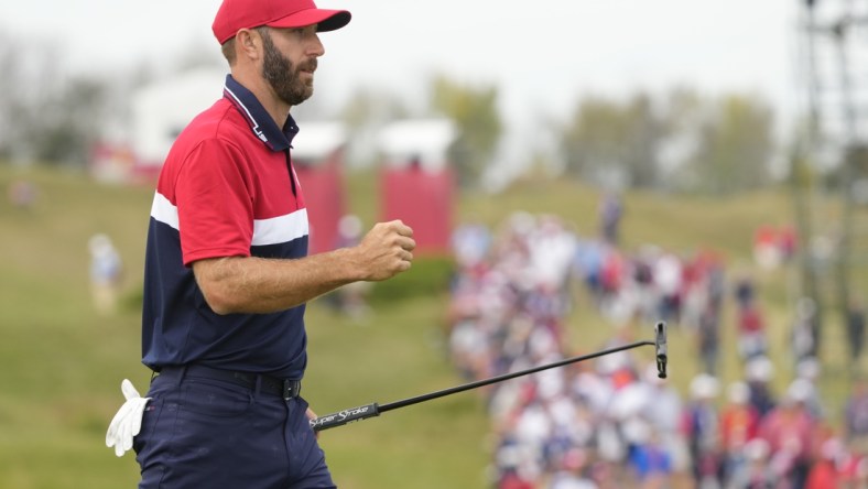 Sep 26, 2021; Haven, Wisconsin, USA; Team USA player Dustin Johnson reacts to his putt on the 15th green during day three singles rounds for the 43rd Ryder Cup golf competition at Whistling Straits. Mandatory Credit: Michael Madrid-USA TODAY Sports