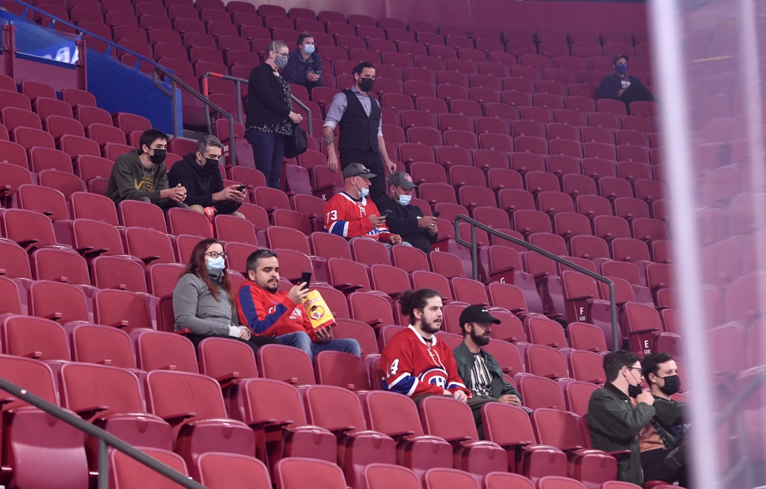 Sep 27, 2021; Montreal, Quebec, CAN; Some of the 7500 fans allowed in look on during the warmup period before a game between the Toronto Maple Leafs and the Montreal Canadiens at the Bell Centre. Mandatory Credit: Eric Bolte-USA TODAY Sports