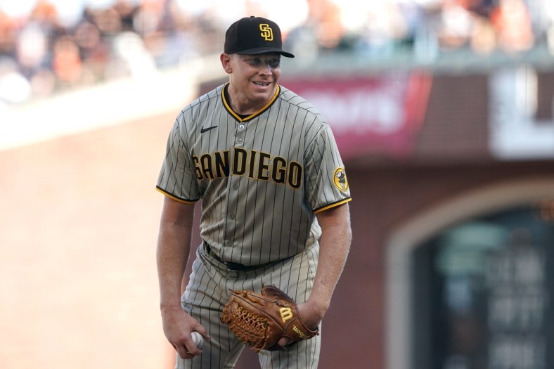 Oct 2, 2021; San Francisco, California, USA; San Diego Padres relief pitcher Mark Melancon (33) prepares to pitch during the tenth inning against the San Francisco Giants at Oracle Park. Mandatory Credit: Darren Yamashita-USA TODAY Sports