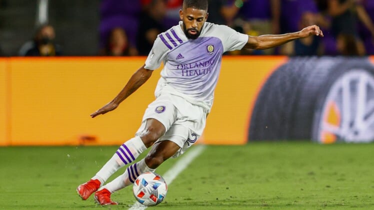 Oct 2, 2021; Orlando, Florida, USA;  Orlando City defender Ruan (2) keeps the ball in play during the second half against D.C. United at Orlando City Stadium. Mandatory Credit: Nathan Ray Seebeck-USA TODAY Sports