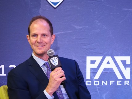Oct 13, 2021; San Francisco, CA, USA; Washington Huskies head coach Mike Hopkins smiles as he answers a questions during Pac-12 men s basketball media day. Mandatory Credit: Kelley L Cox-USA TODAY Sports
