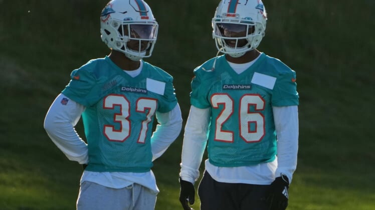 Two Miami Dolphins running backs test positive