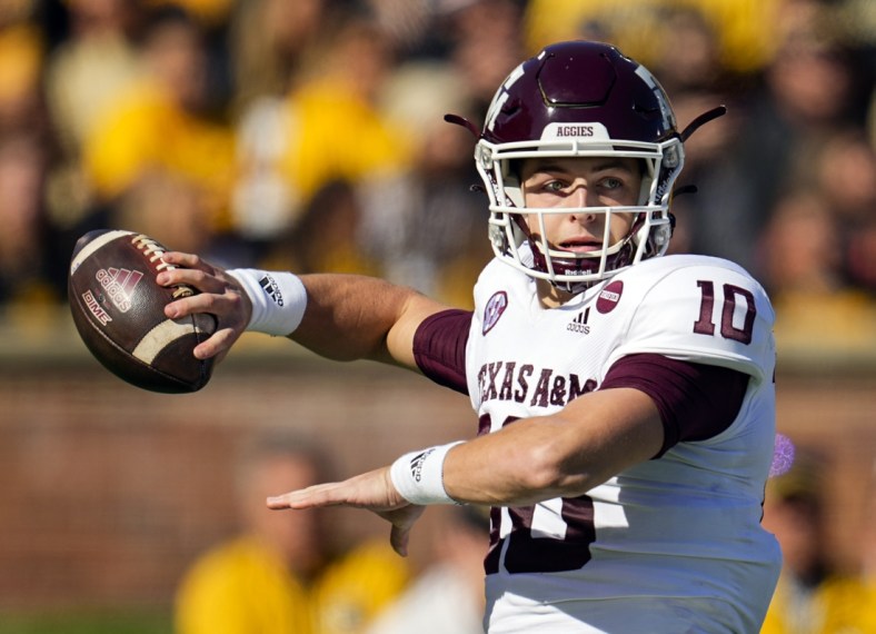 Oct 16, 2021; Columbia, Missouri, USA; Texas A&M Aggies quarterback Zach Calzada (10) throws a pass against the Missouri Tigers during the first half at Faurot Field at Memorial Stadium. Mandatory Credit: Jay Biggerstaff-USA TODAY Sports
