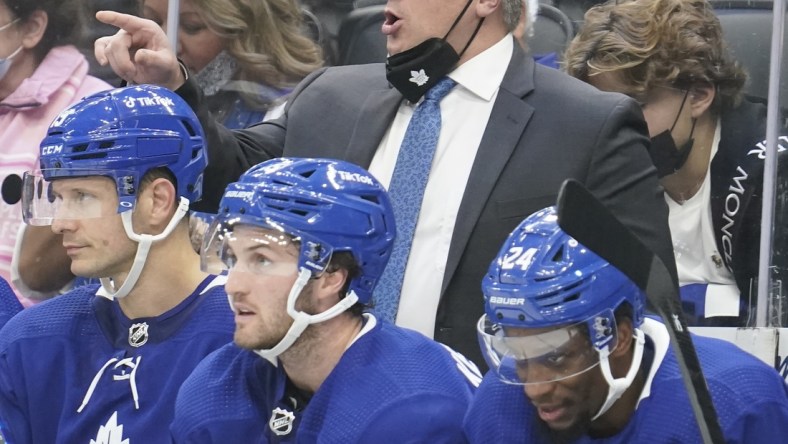 Oct 16, 2021; Toronto, Ontario, CAN; Toronto Maple Leafs head coach Sheldon Keefe gives instructions during the third period against the Ottawa Senators at Scotiabank Arena. Mandatory Credit: John E. Sokolowski-USA TODAY Sports