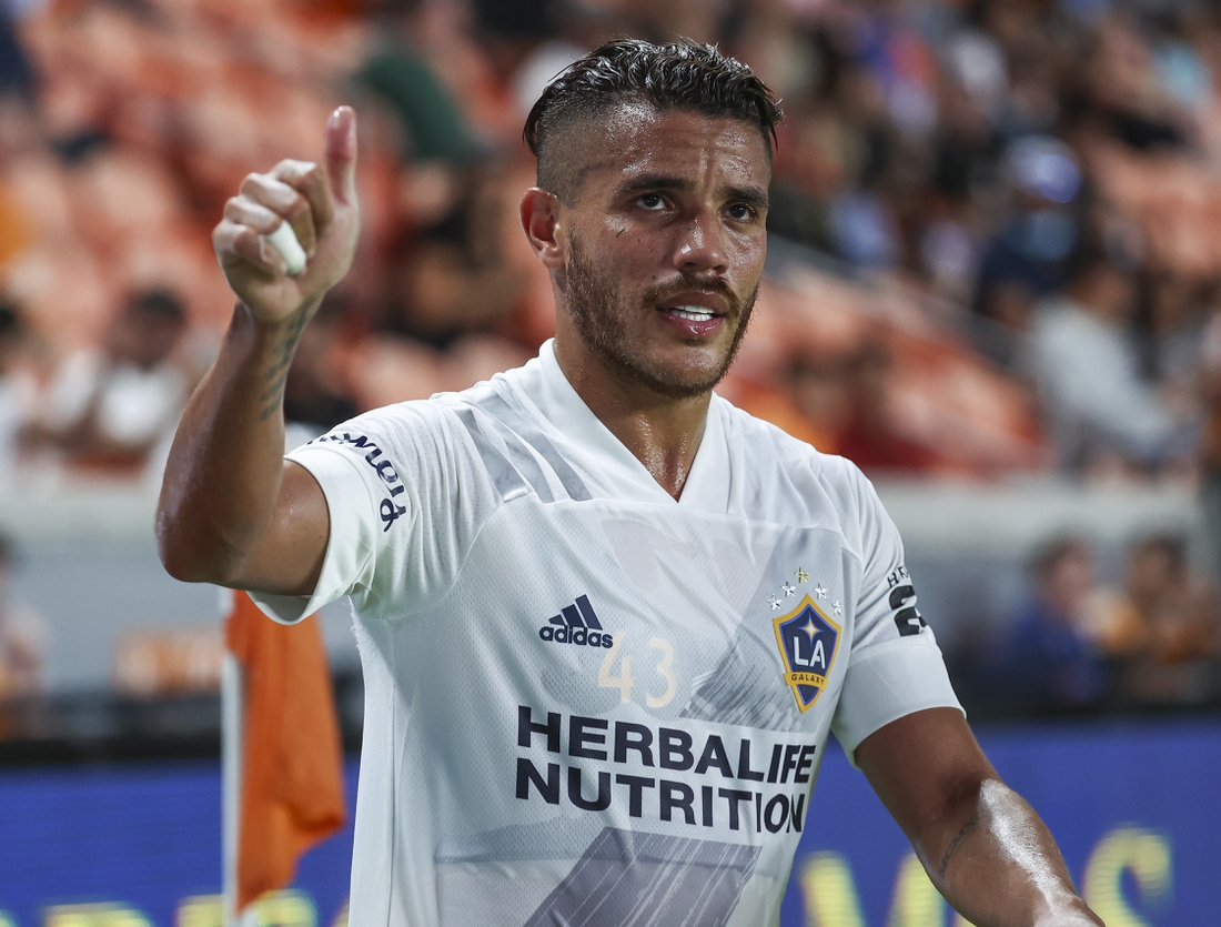 Oct 20, 2021; Houston, Texas, USA; LA Galaxy midfielder Jonathan dos Santos (8) walks off the field during the second half against the Houston Dynamo FC at PNC Stadium. Mandatory Credit: Troy Taormina-USA TODAY Sports