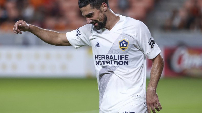 Oct 20, 2021; Houston, Texas, USA; LA Galaxy midfielder Sebastian Lletget (17) reacts after a play during the second half against the Houston Dynamo FC at PNC Stadium. Mandatory Credit: Troy Taormina-USA TODAY Sports