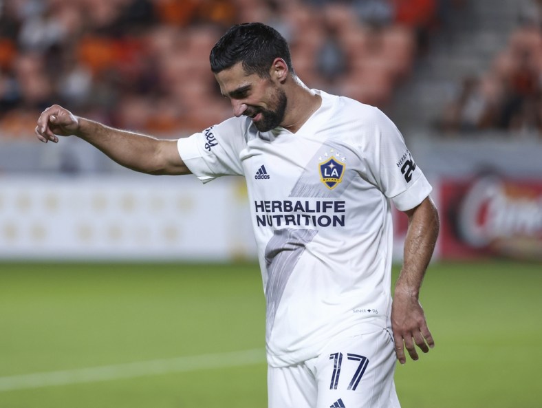 Oct 20, 2021; Houston, Texas, USA; LA Galaxy midfielder Sebastian Lletget (17) reacts after a play during the second half against the Houston Dynamo FC at PNC Stadium. Mandatory Credit: Troy Taormina-USA TODAY Sports