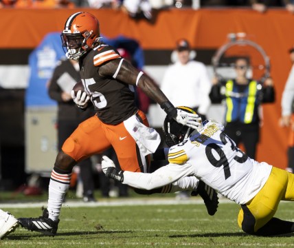 Oct 31, 2021; Cleveland, Ohio, USA; Cleveland Browns tight end David Njoku (85) sheds a tackle from Pittsburgh Steelers inside linebacker Joe Schobert (93) during the fourth quarter at FirstEnergy Stadium. Mandatory Credit: Scott Galvin-USA TODAY Sports