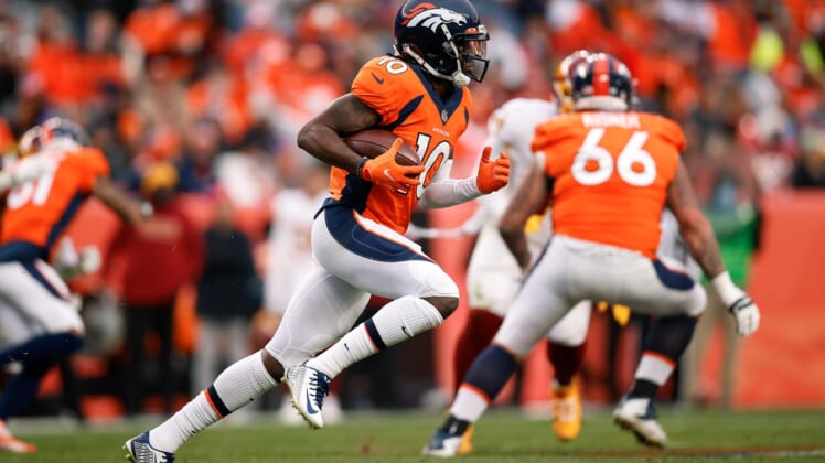 Oct 31, 2021; Denver, Colorado, USA; Denver Broncos wide receiver Jerry Jeudy (10) runs the ball in the fourth quarter against the Washington Football Team at Empower Field at Mile High. Mandatory Credit: Isaiah J. Downing-USA TODAY Sports