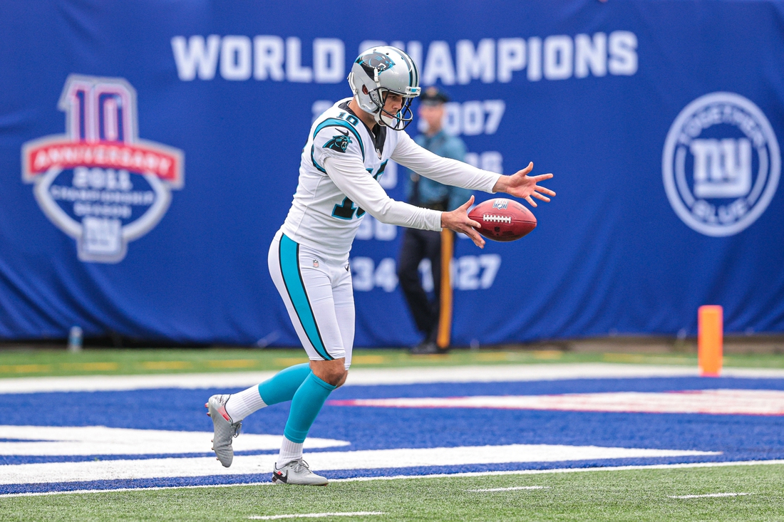 Oct 24, 2021; East Rutherford, New Jersey, USA; Carolina Panthers punter Ryan Winslow (10) punts the ball against the New York Giants during the first half at MetLife Stadium. Mandatory Credit: Vincent Carchietta-USA TODAY Sports