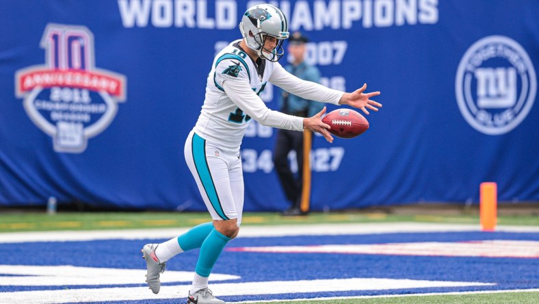 Oct 24, 2021; East Rutherford, New Jersey, USA; Carolina Panthers punter Ryan Winslow (10) punts the ball against the New York Giants during the first half at MetLife Stadium. Mandatory Credit: Vincent Carchietta-USA TODAY Sports