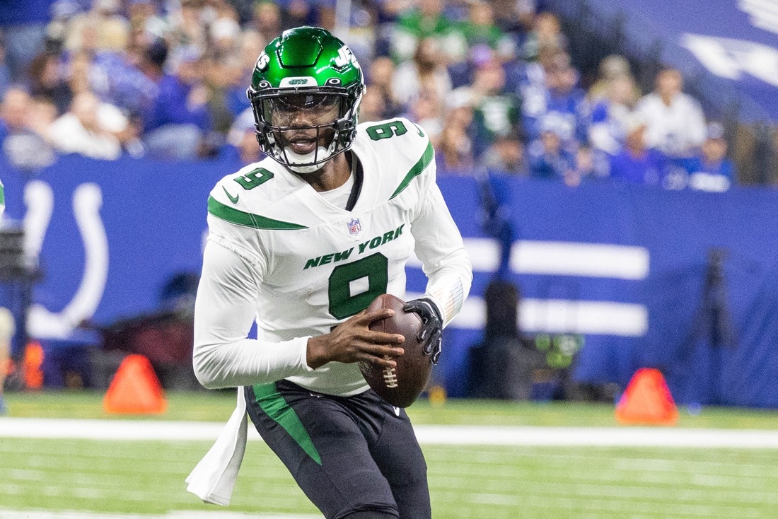 Nov 4, 2021; Indianapolis, Indiana, USA; New York Jets quarterback Josh Johnson (9) looks to pass the ball in the second quarter against the Indianapolis Colts at Lucas Oil Stadium. Mandatory Credit: Trevor Ruszkowski-USA TODAY Sports