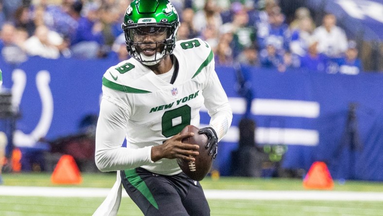 Nov 4, 2021; Indianapolis, Indiana, USA; New York Jets quarterback Josh Johnson (9) looks to pass the ball in the second quarter against the Indianapolis Colts at Lucas Oil Stadium. Mandatory Credit: Trevor Ruszkowski-USA TODAY Sports