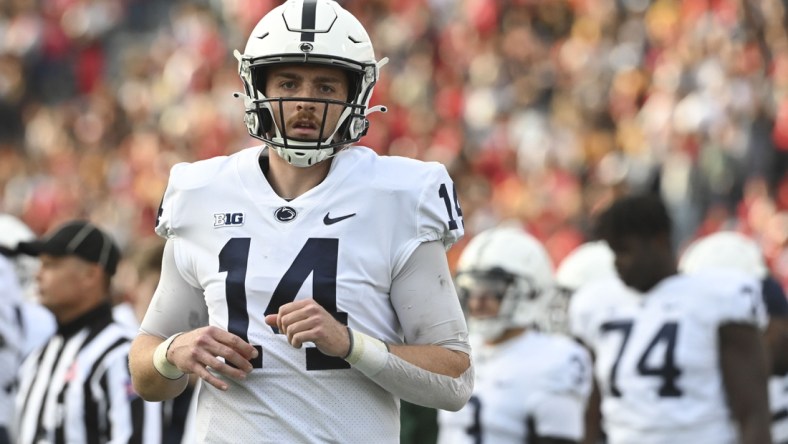 Nov 6, 2021; College Park, Maryland, USA;  Penn State Nittany Lions quarterback Sean Clifford (14) stands on the field during the first half against the Maryland Terrapins at Capital One Field at Maryland Stadium. Mandatory Credit: Tommy Gilligan-USA TODAY Sports