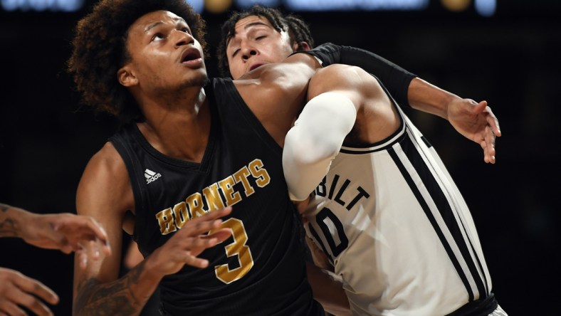 Nov 10, 2021; Nashville, Tennessee, USA; Alabama State Hornets forward Gerald Liddell (3) battles for position with Vanderbilt Commodores forward Myles Stute (10) on a free throw during the first half at Memorial Gymnasium. Mandatory Credit: Christopher Hanewinckel-USA TODAY Sports