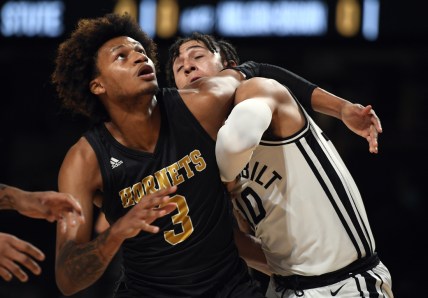 Nov 10, 2021; Nashville, Tennessee, USA; Alabama State Hornets forward Gerald Liddell (3) battles for position with Vanderbilt Commodores forward Myles Stute (10) on a free throw during the first half at Memorial Gymnasium. Mandatory Credit: Christopher Hanewinckel-USA TODAY Sports