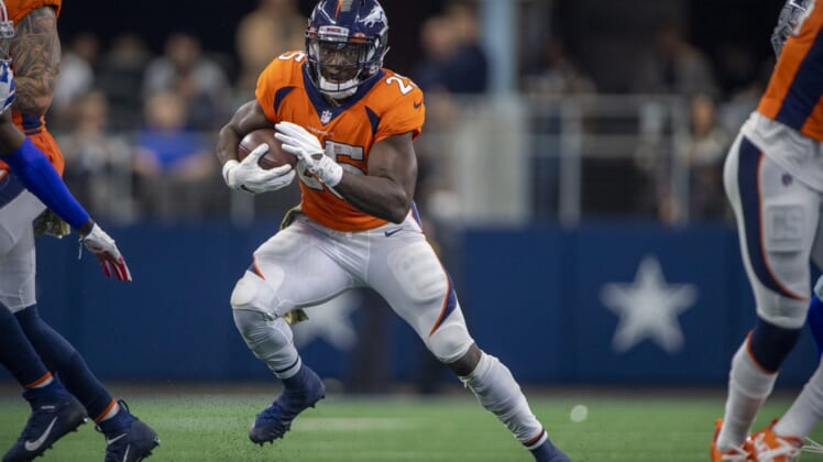 Nov 7, 2021; Arlington, Texas, USA; Denver Broncos running back Melvin Gordon III (25) in action during the game between the Dallas Cowboys and the Denver Broncos at AT&T Stadium. Mandatory Credit: Jerome Miron-USA TODAY Sports