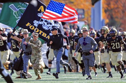 Nov 13, 2021; West Point, New York, USA; Army Black Knights head coach Jeff Monken leads his team out onto the field before a game against the Bucknell Bisons at Michie Stadium. Mandatory Credit: Danny Wild-USA TODAY Sports