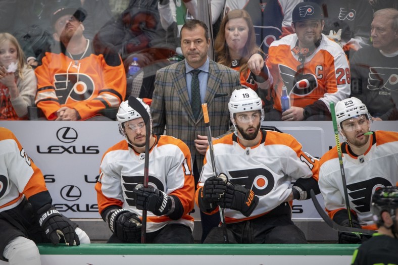 Nov 13, 2021; Dallas, Texas, USA; Philadelphia Flyers head coach Alain Vigneault watches his team take on the Dallas Stars during the third period at the American Airlines Center. Mandatory Credit: Jerome Miron-USA TODAY Sports