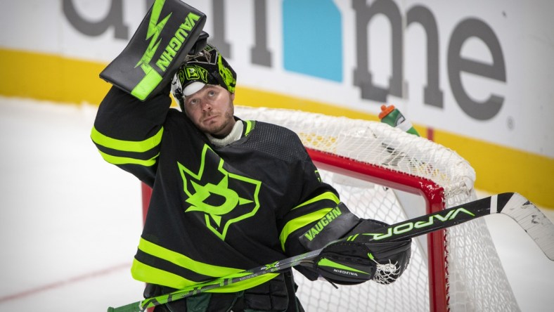 Nov 13, 2021; Dallas, Texas, USA; Dallas Stars goaltender Anton Khudobin (35) checks the replay screen during the third period against the Philadelphia Flyers at the American Airlines Center. Mandatory Credit: Jerome Miron-USA TODAY Sports