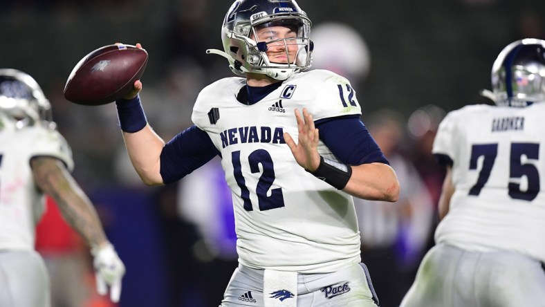 Nov 13, 2021; Carson, California, USA; Nevada Wolf Pack quarterback Carson Strong (12) throws against the San Diego State Aztecs during the second half at Dignity Health Sports Park. Mandatory Credit: Gary A. Vasquez-USA TODAY Sports