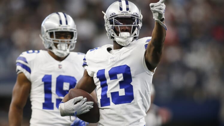 Nov 14, 2021; Arlington, Texas, USA; Dallas Cowboys wide receiver Michael Gallup (13) reacts after making a first down in the first quarter against the Atlanta Falcons at AT&T Stadium. Mandatory Credit: Tim Heitman-USA TODAY Sports