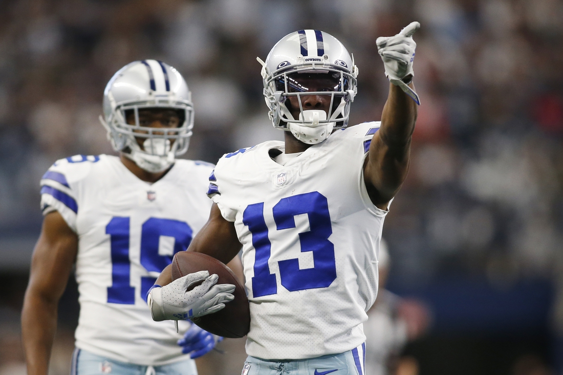 Nov 14, 2021; Arlington, Texas, USA; Dallas Cowboys wide receiver Michael Gallup (13) reacts after making a first down in the first quarter against the Atlanta Falcons at AT&T Stadium. Mandatory Credit: Tim Heitman-USA TODAY Sports