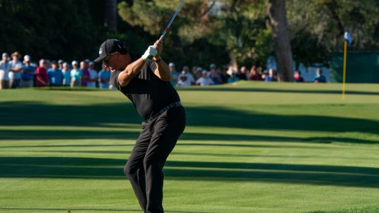 Nov 14, 2021; Phoenix, Arizona, USA; Phil Mickelson with this approach to the 17th during the final round of the Charles Schwab Cup Championship golf tournament at Phoenix Country Club. Mandatory Credit: Allan Henry-USA TODAY Sports