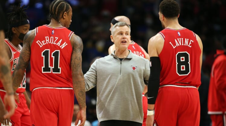 Nov 14, 2021; Los Angeles, California, USA; Chicago Bulls head coach Billy Donovan talks to forward DeMar DeRozan (11) and guard Zach LaVine (8) during a timeout of the NBA game against the Los Angeles Clippers at Staples Center. The Bulls wins 100-90. Mandatory Credit: Kiyoshi Mio-USA TODAY Sports