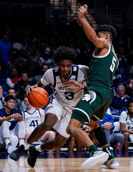 Butler Bulldogs guard Chuck Harris (3) rushes the ball toward the net against Michigan State Spartans guard Max Christie (5) on Wednesday, Nov. 17, 2021, at Hinkle Fieldhouse, in Indianapolis. Michigan State Spartans defeat the Butler Bulldogs, 73-52.

Ncaa Basketball Ini 1117 Ncaa Men S Basketball Michigan State At Butler